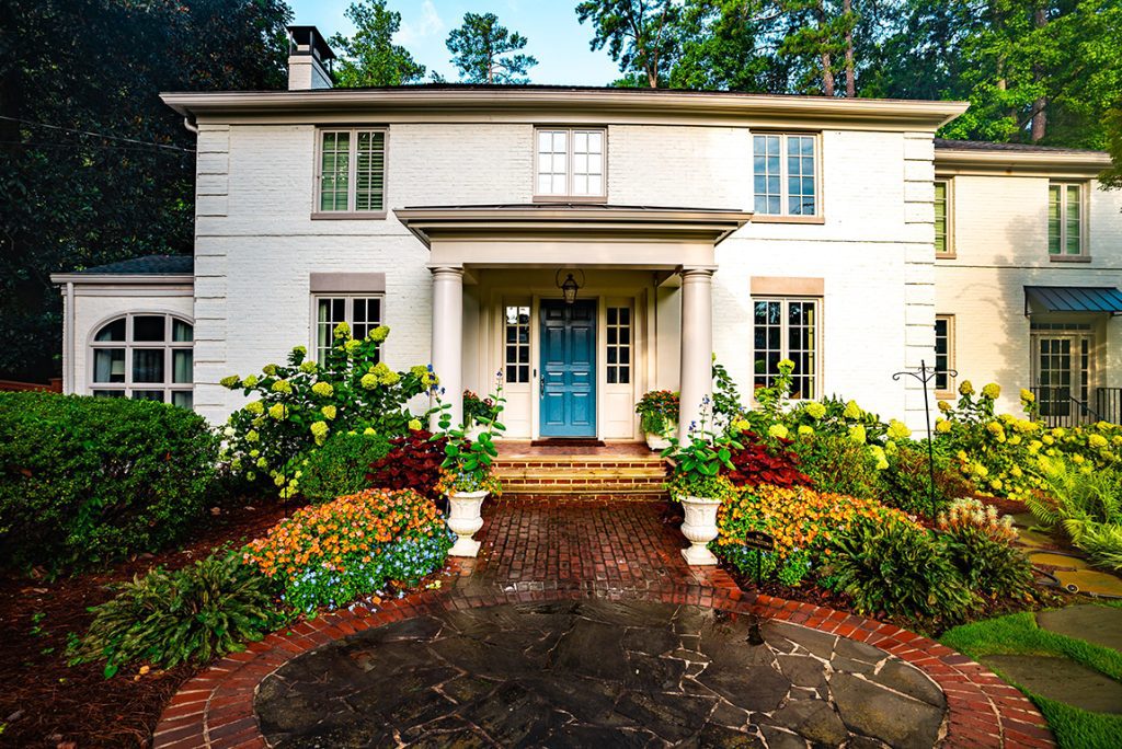 House with flowered entry