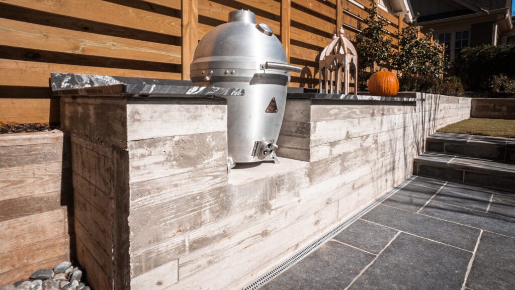 Cast concrete wall with blaze grill